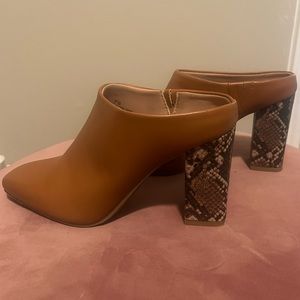 Tan mules with alligator print heels